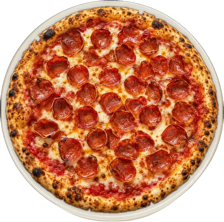 Top-down pepperoni pizza in a black pan